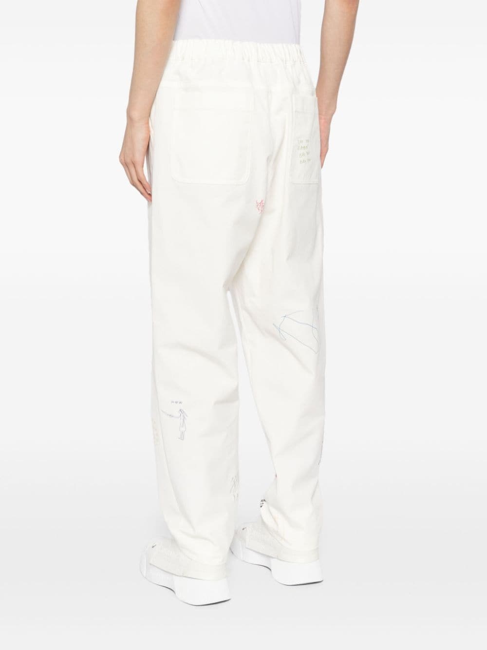 sketch-style printed trousers - 4