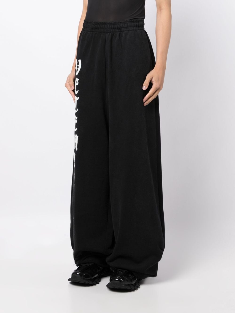 VETEMENTS logo print cotton track pants REVERSIBLE