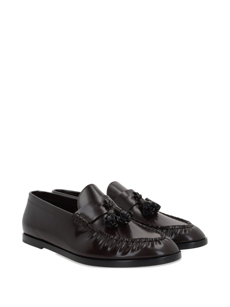 The Row tassel-detail loafers outlook