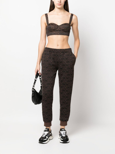 Moschino monogram-print joggers outlook