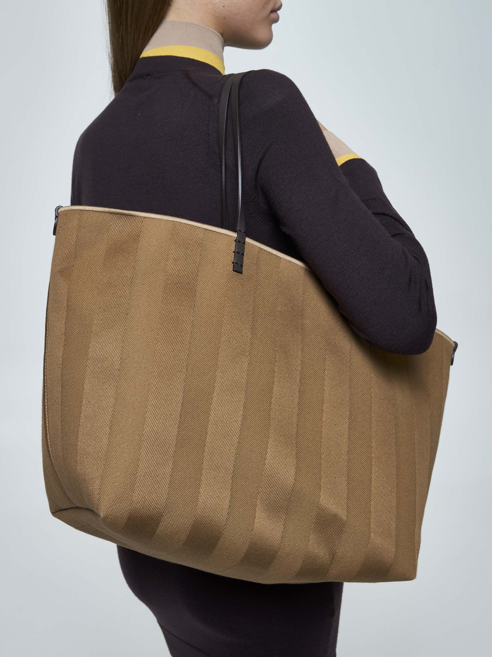 FENDI Roll Large reversible fabric bag | danielloboutique