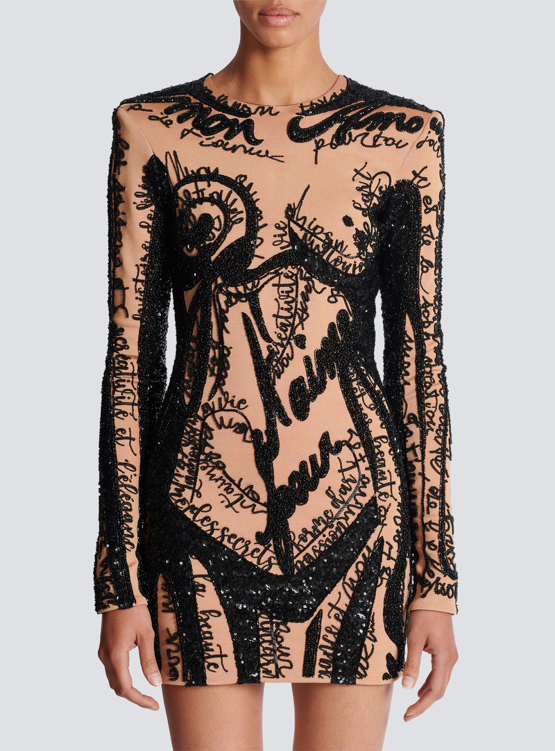 Short embroidered dress with body motif 5