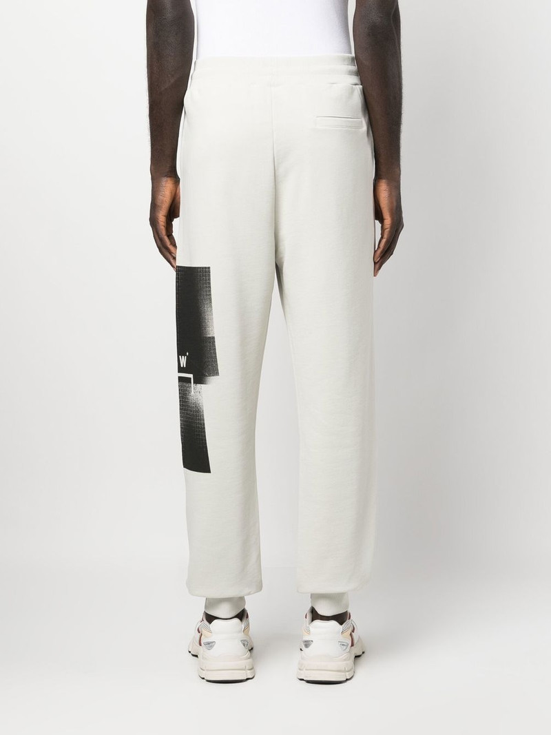 Brutalist logo-print track pants 4