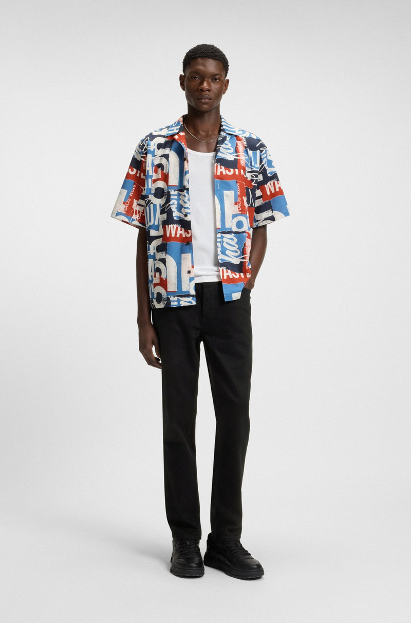 HUGO TAPERED-FIT JEANS IN BLACK STRETCH DENIM outlook