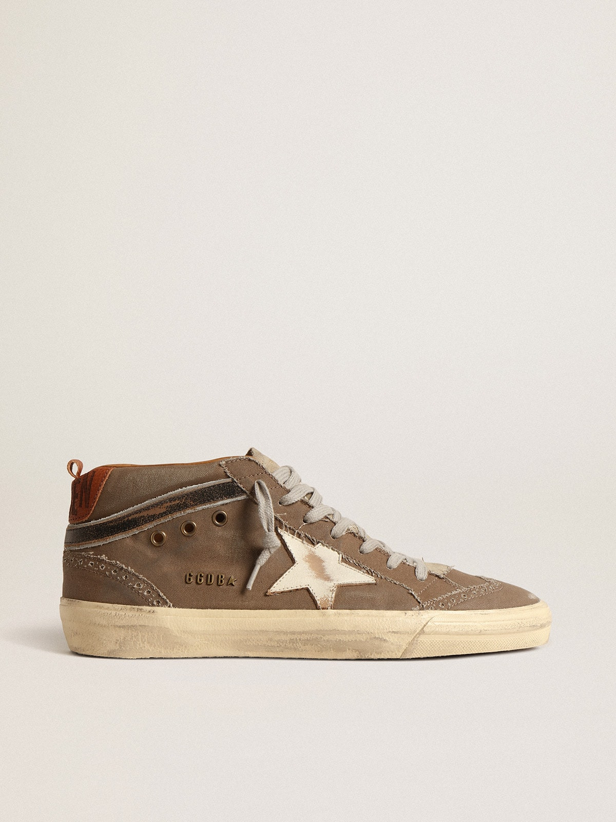 Mid Star LTD in green canvas with leather star and black flash - 1