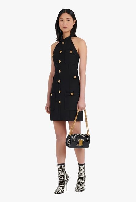 Open-back black dress with gold-tone buttons - 2