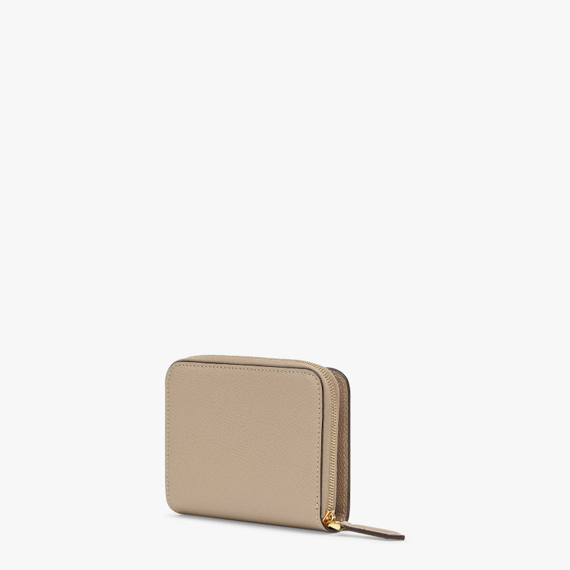 F is Fendi compact bi-fold wallet. Interior organized into a bill compartment and card holder slot.  2