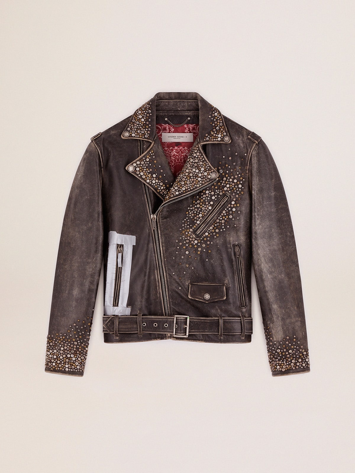 Men's leather biker jacket with hammered studs and adhesive tape - 1