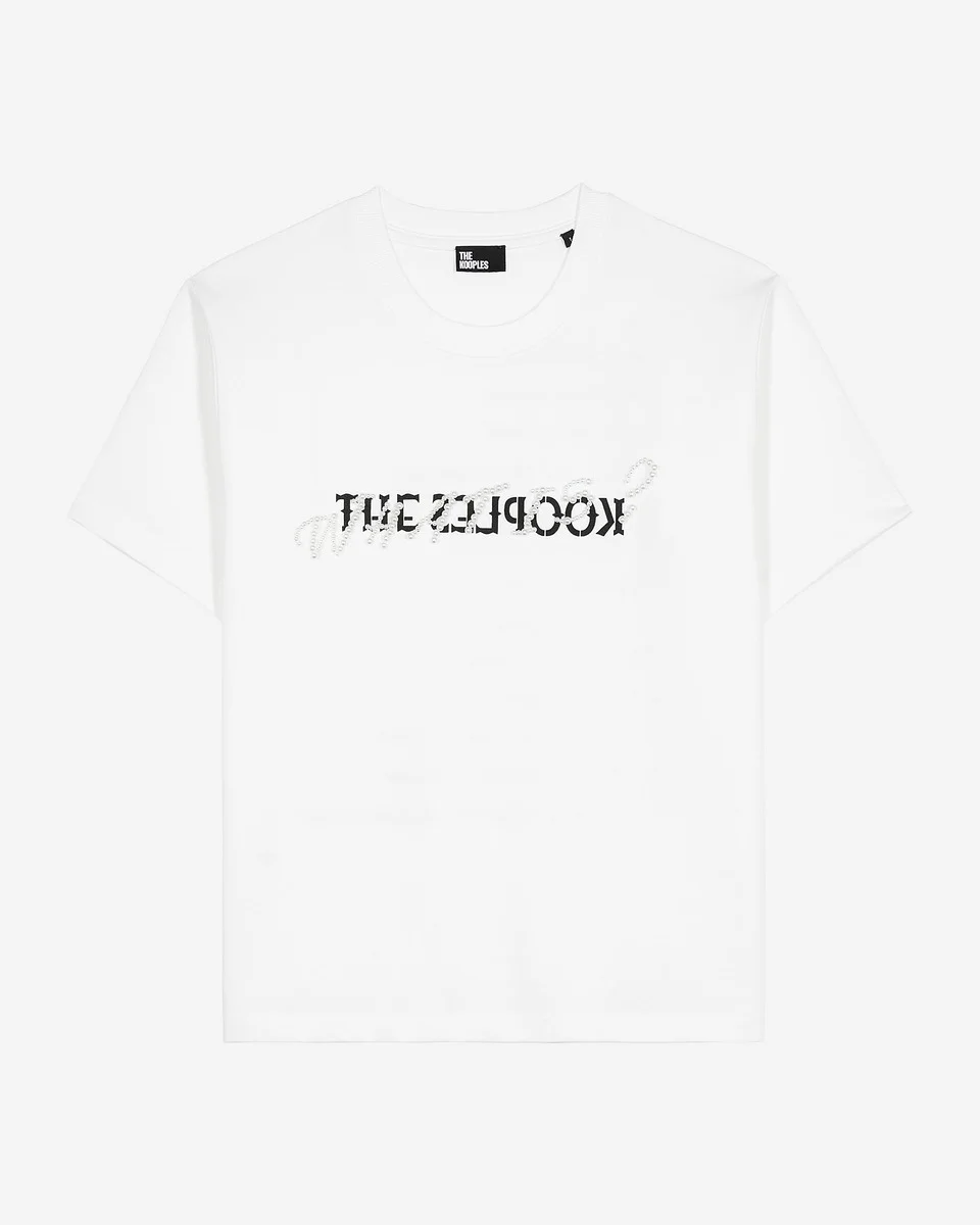 WHAT IS T-SHIRT WITH WHITE BEADS - 1
