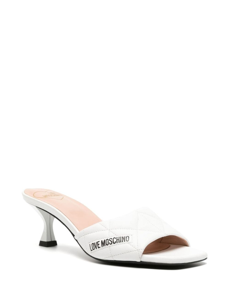 Moschino logo-print 65mm quilted mules outlook
