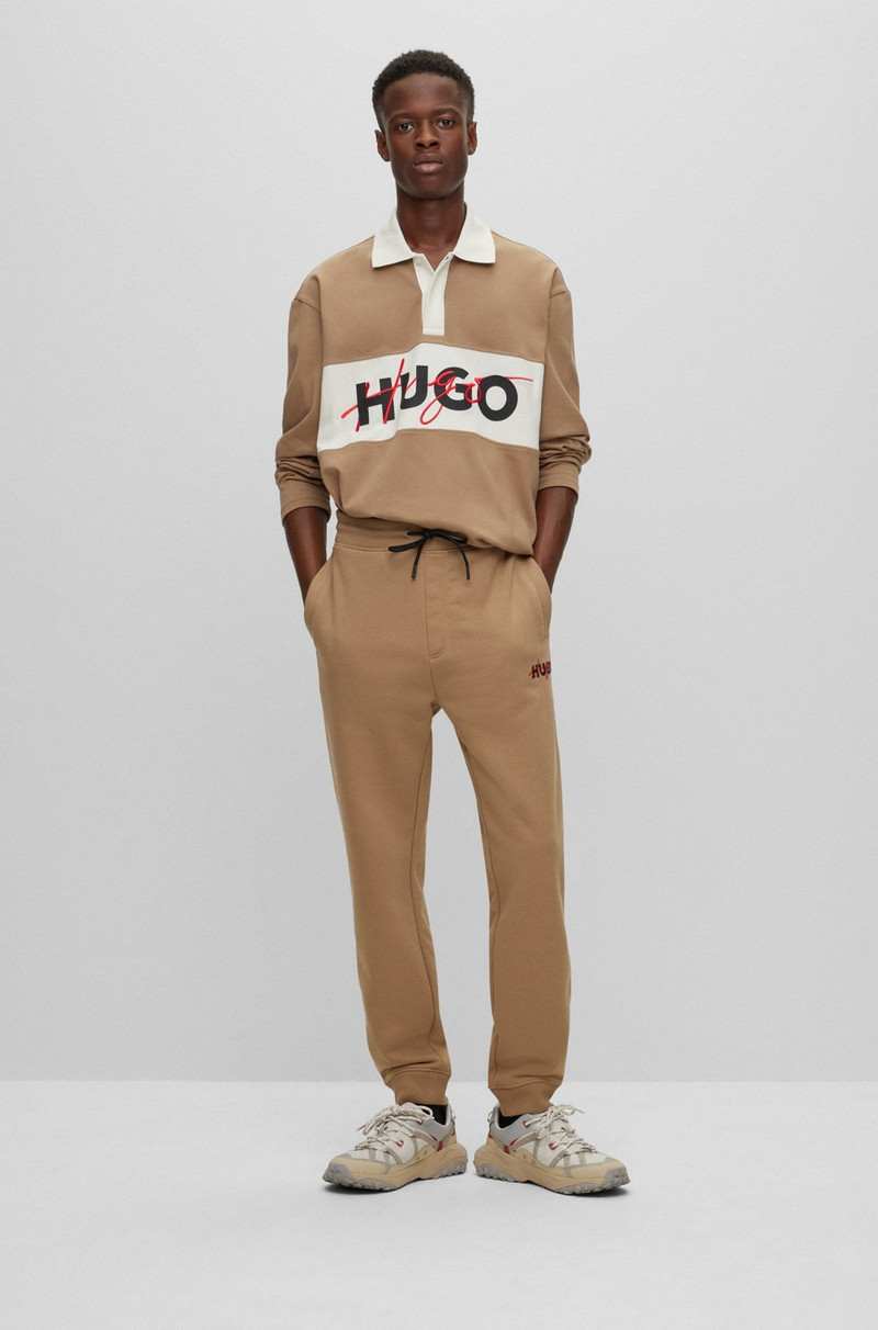 HUGO MONOGRAM-PRINT TRACKSUIT BOTTOMS WITH STRIPED TAPE outlook