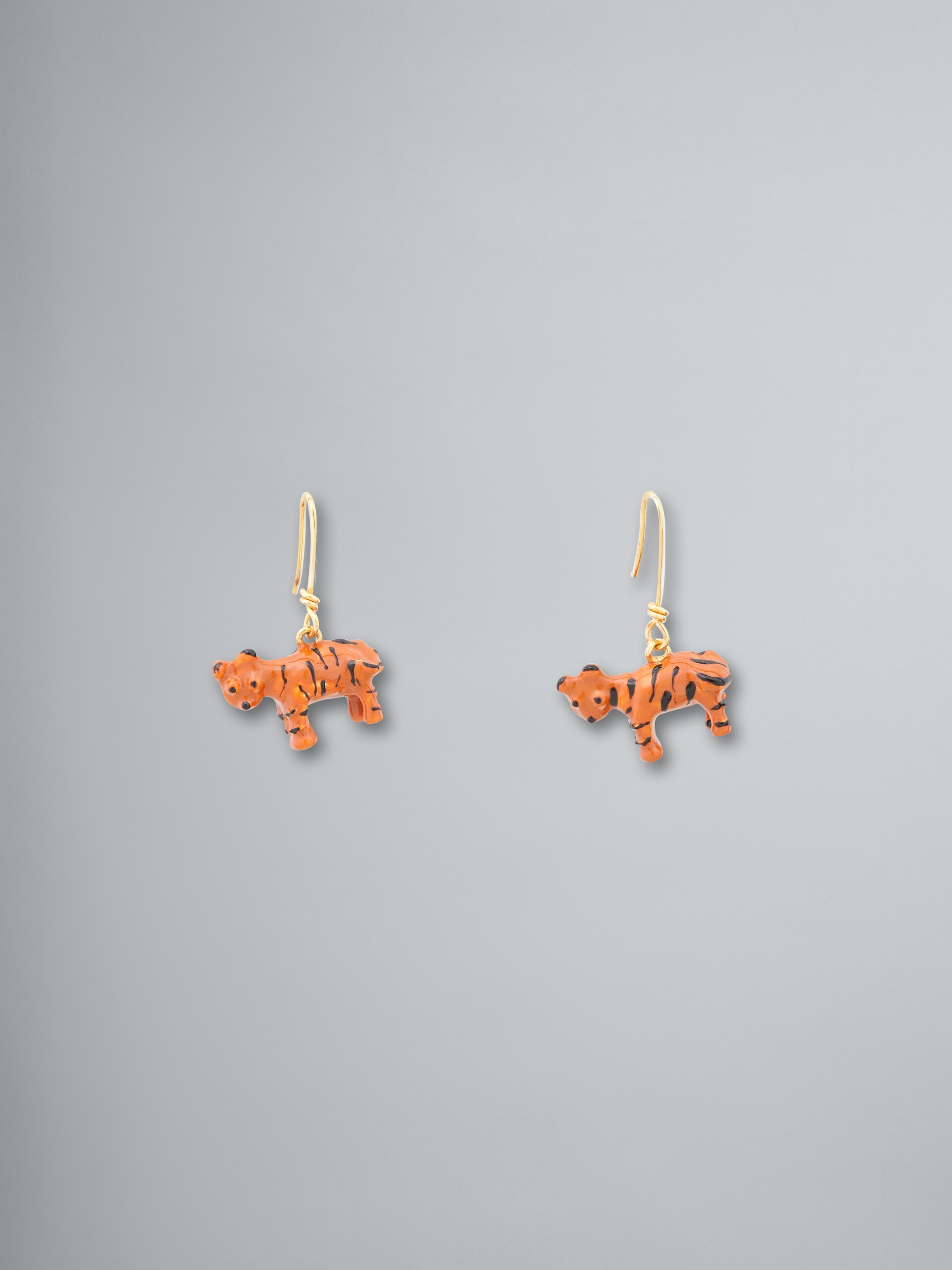 NAIF TIGER HOOK EARRINGS IN METAL AND RESIN - 1