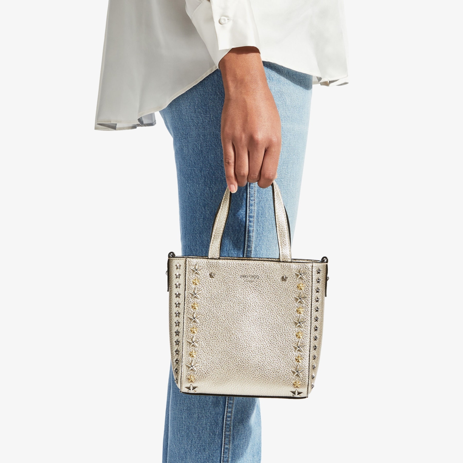 Mini Pegasi
Light Gold Metallic Soft Calf Mini Tote Bag with Stars - 2