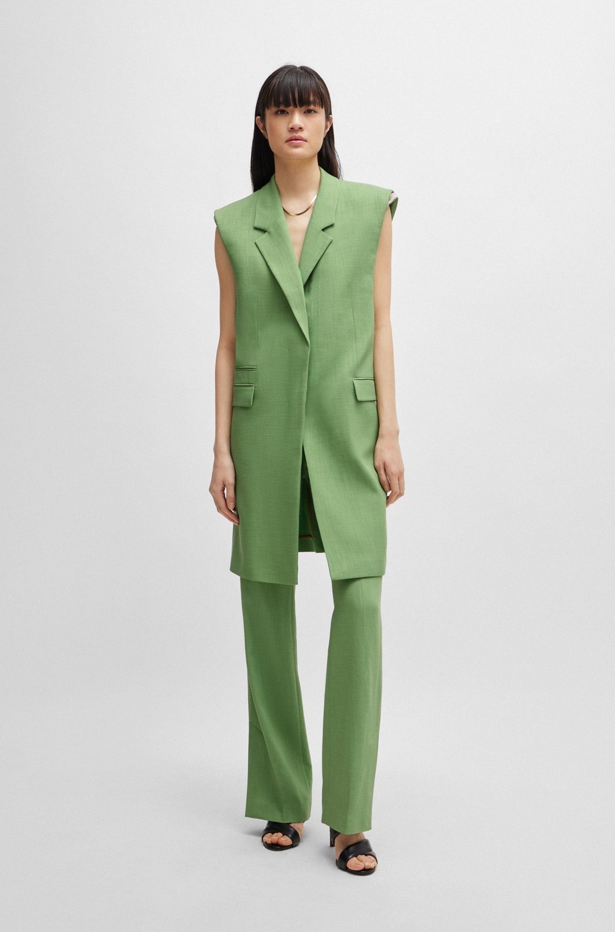 SLEEVELESS JACKET WITH CONCEALED CLOSURE AND SIGNATURE LINING - 2
