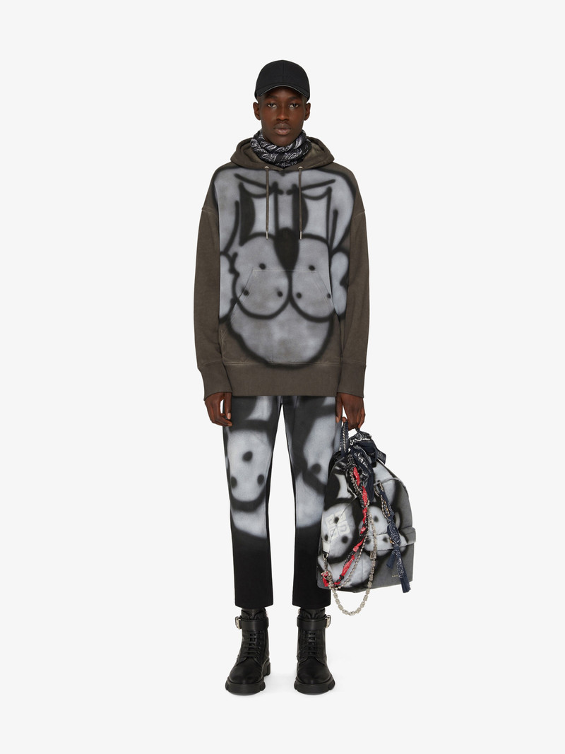 Givenchy SLIM FIT JEANS IN 4G DENIM WITH TAG EFFECT PRINTS outlook