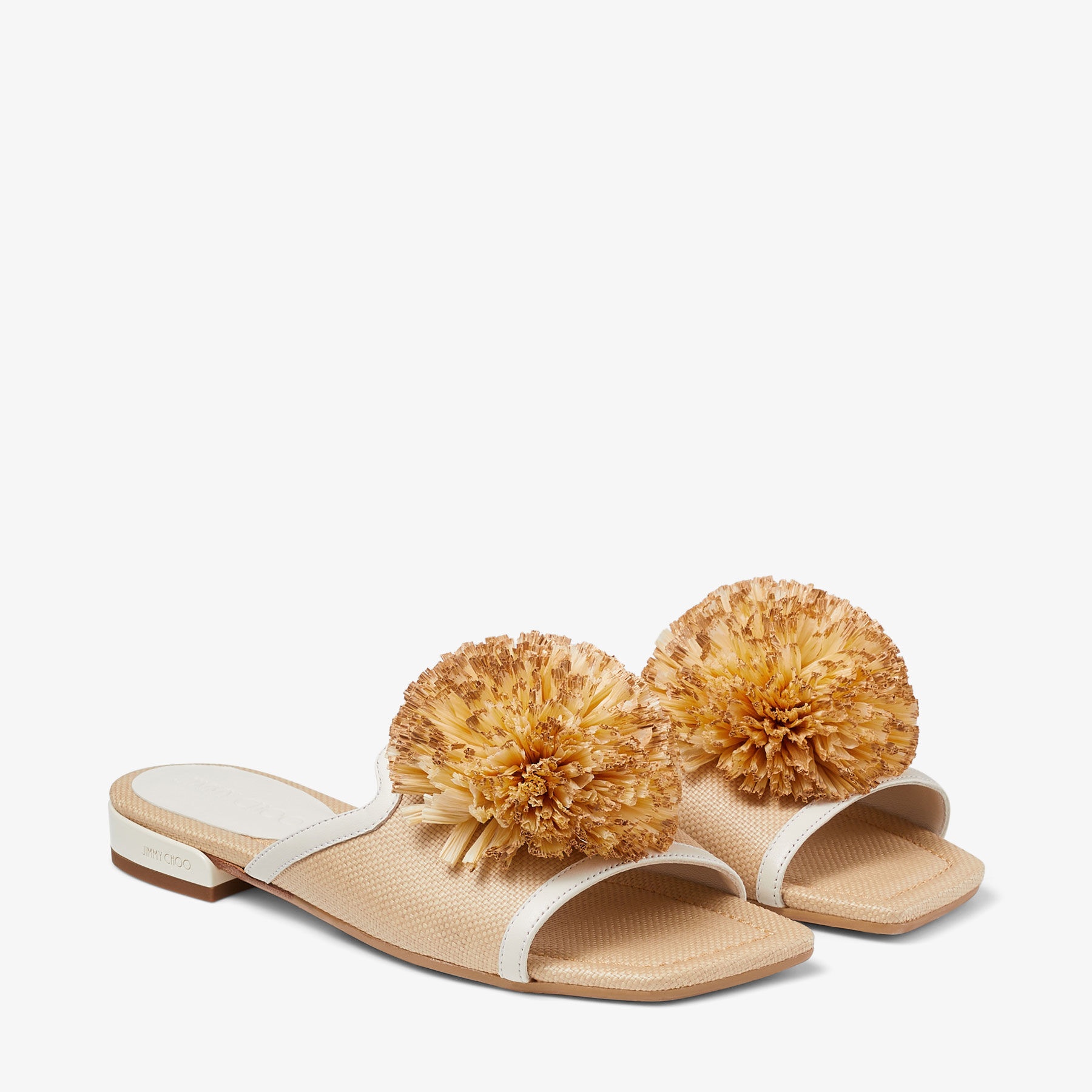 Nako Flat
Natural/Latte Raffia Pom Pom Flats - 2