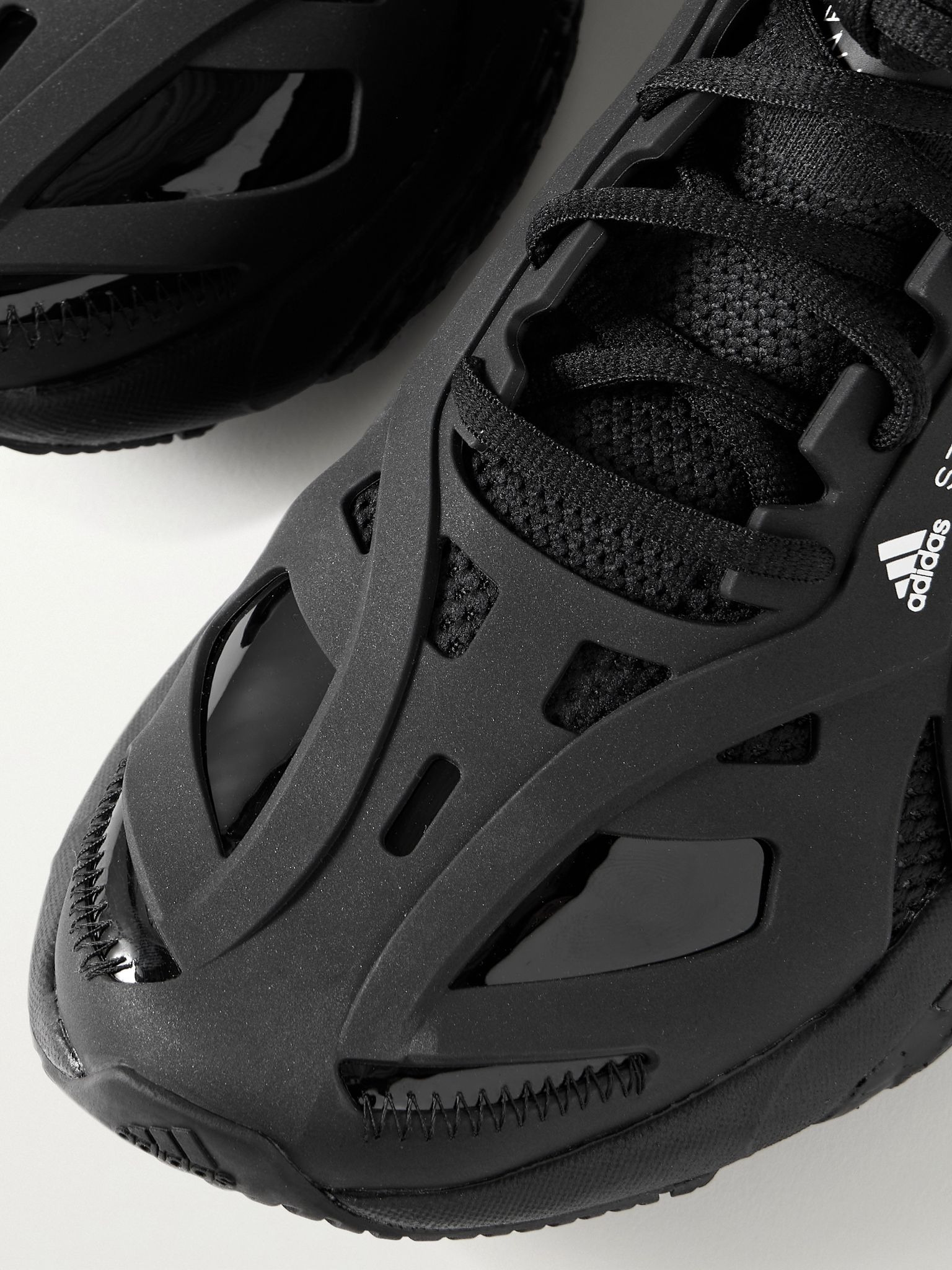 Solarglide Primeknit and rubber sneakers Black - 4