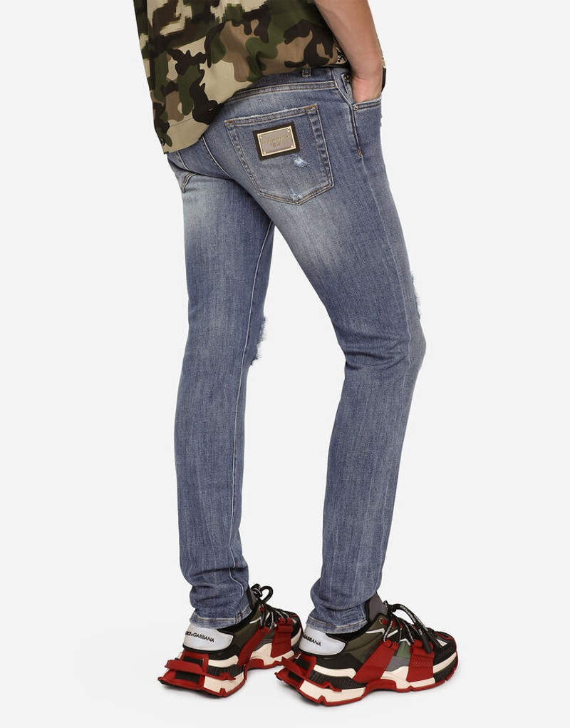 Blue wash skinny stretch jeans with rips 3