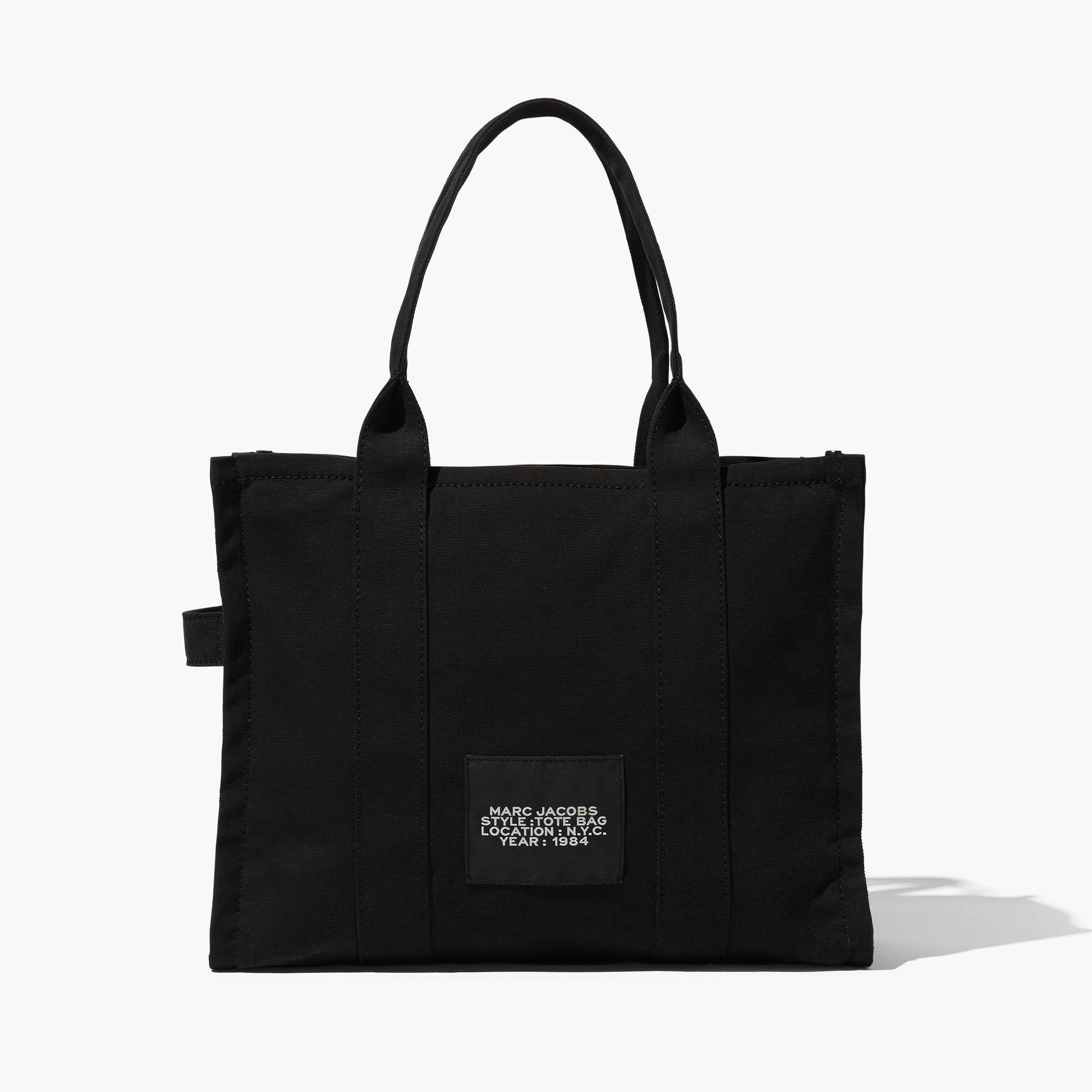 トートバッグ The Large Tote Bag in Black Canvas Marc Jacobs THE LARGE TOTE BAG | REVERSIBLE