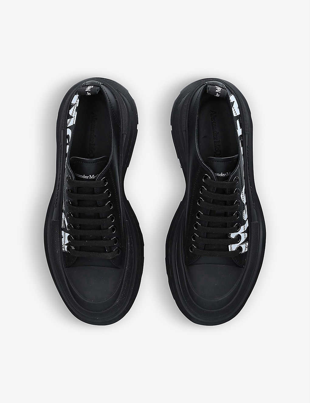 Tread Slick logo-embossed leather low-top trainers - 2