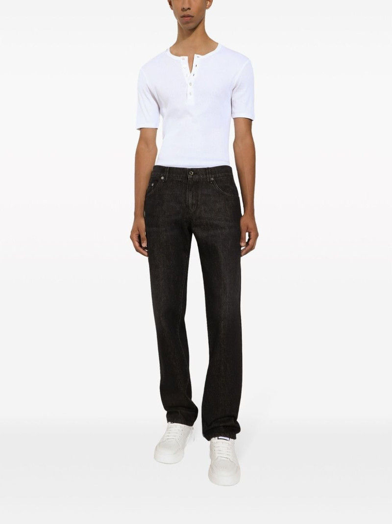 Dolce & Gabbana logo-appliquÃ© long-length tapered jeans outlook