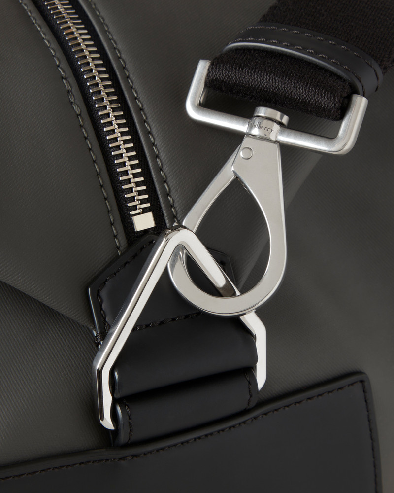 Dalston Holdall
Asphalt & Black Coated Canvas & Rubberised Leather 6