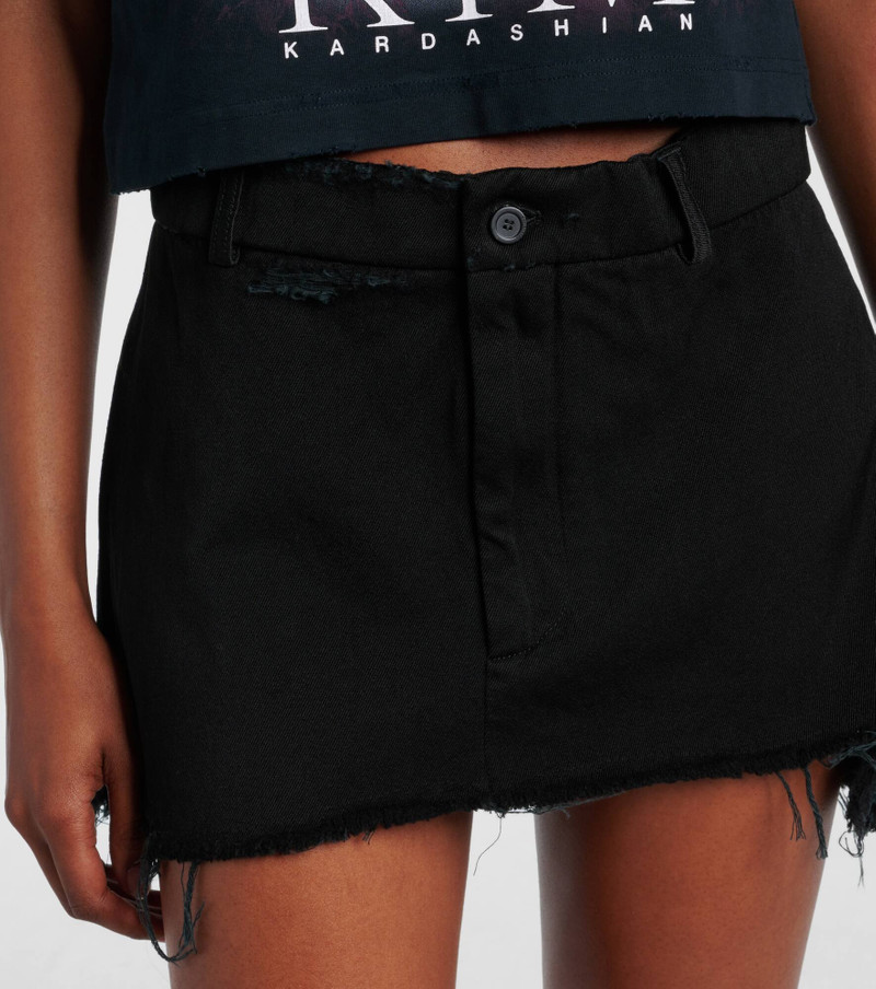 Distressed denim miniskirt 4