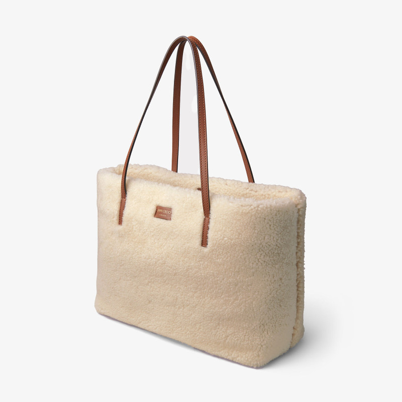 JIMMY CHOO Nine2five E/w
Natural Curly Shearling and Dark Tan Smooth Calf Leather Tote Handbag with JC Emblem outlook