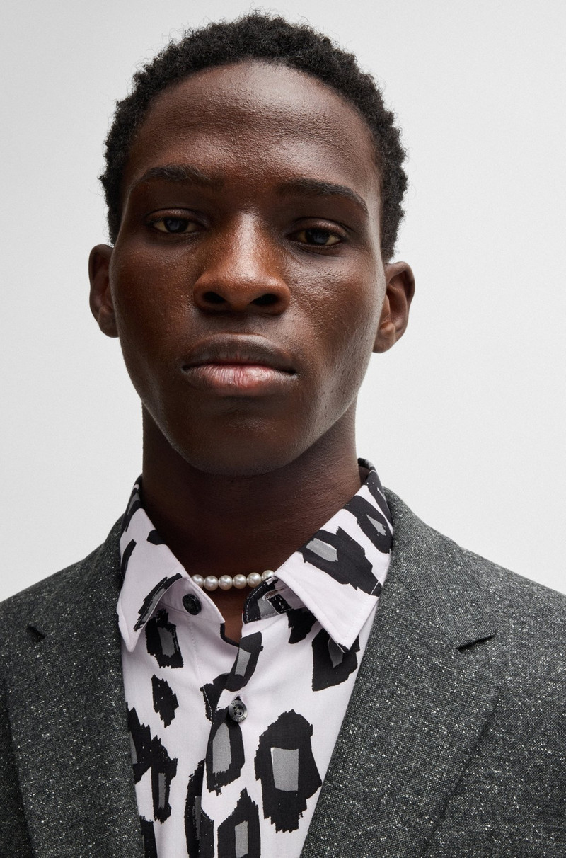 SLIM-FIT SUIT IN MICRO-PATTERNED WOOL 4