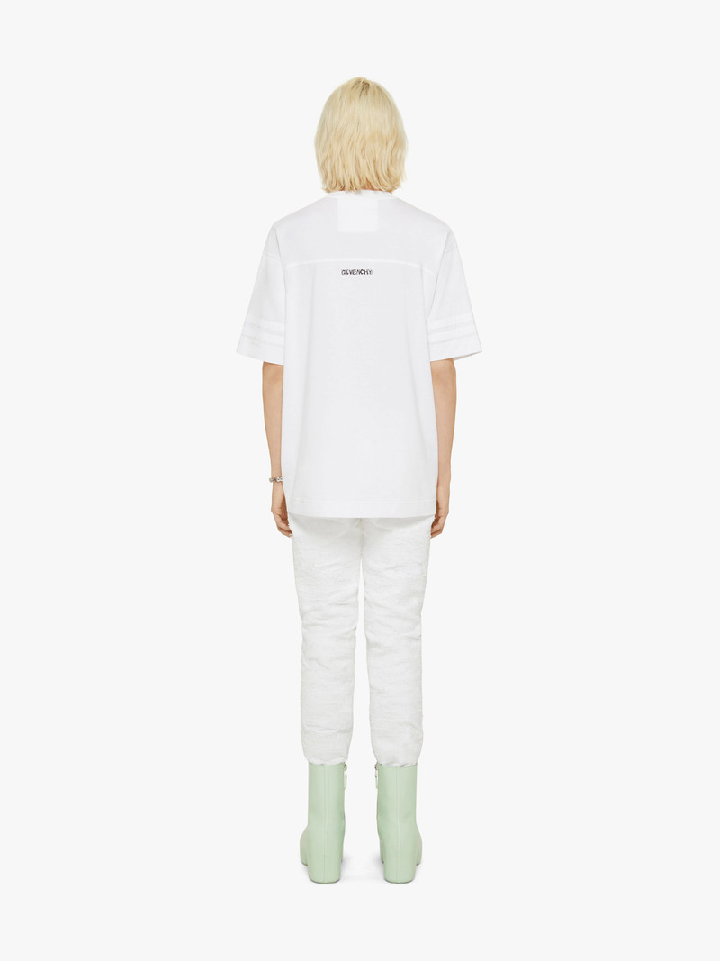 SLIM FIT JEANS IN DESTROYED DENIM 4