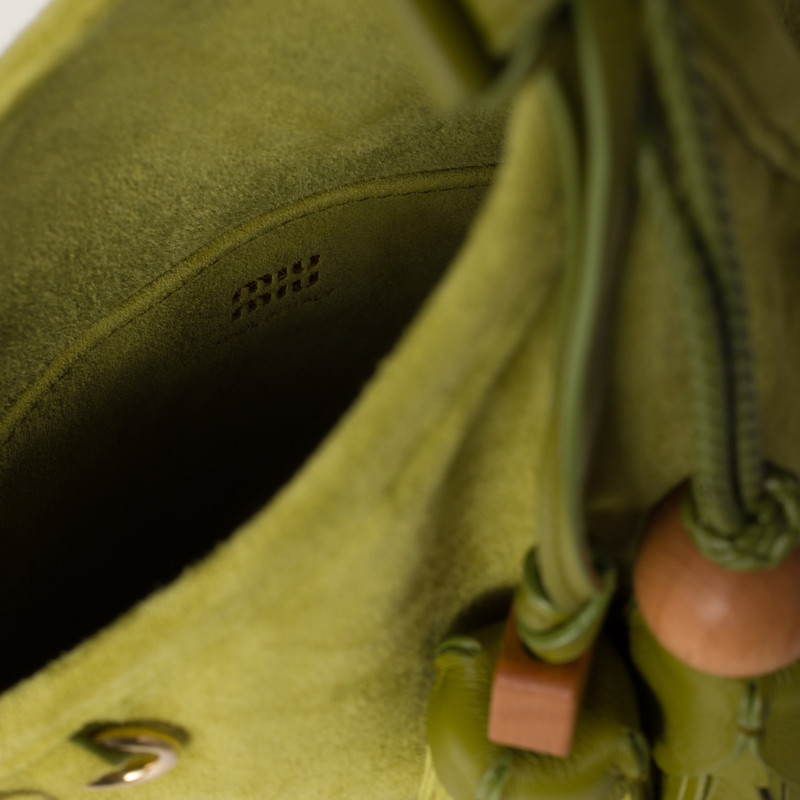 Suede handbag with tassels 4