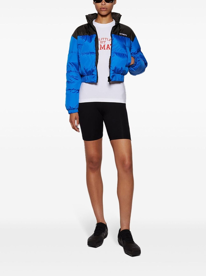 VETEMENTS logo-print puffer jacket outlook