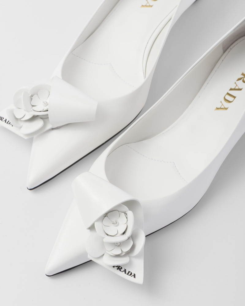 Brushed leather pumps with floral appliqués 6