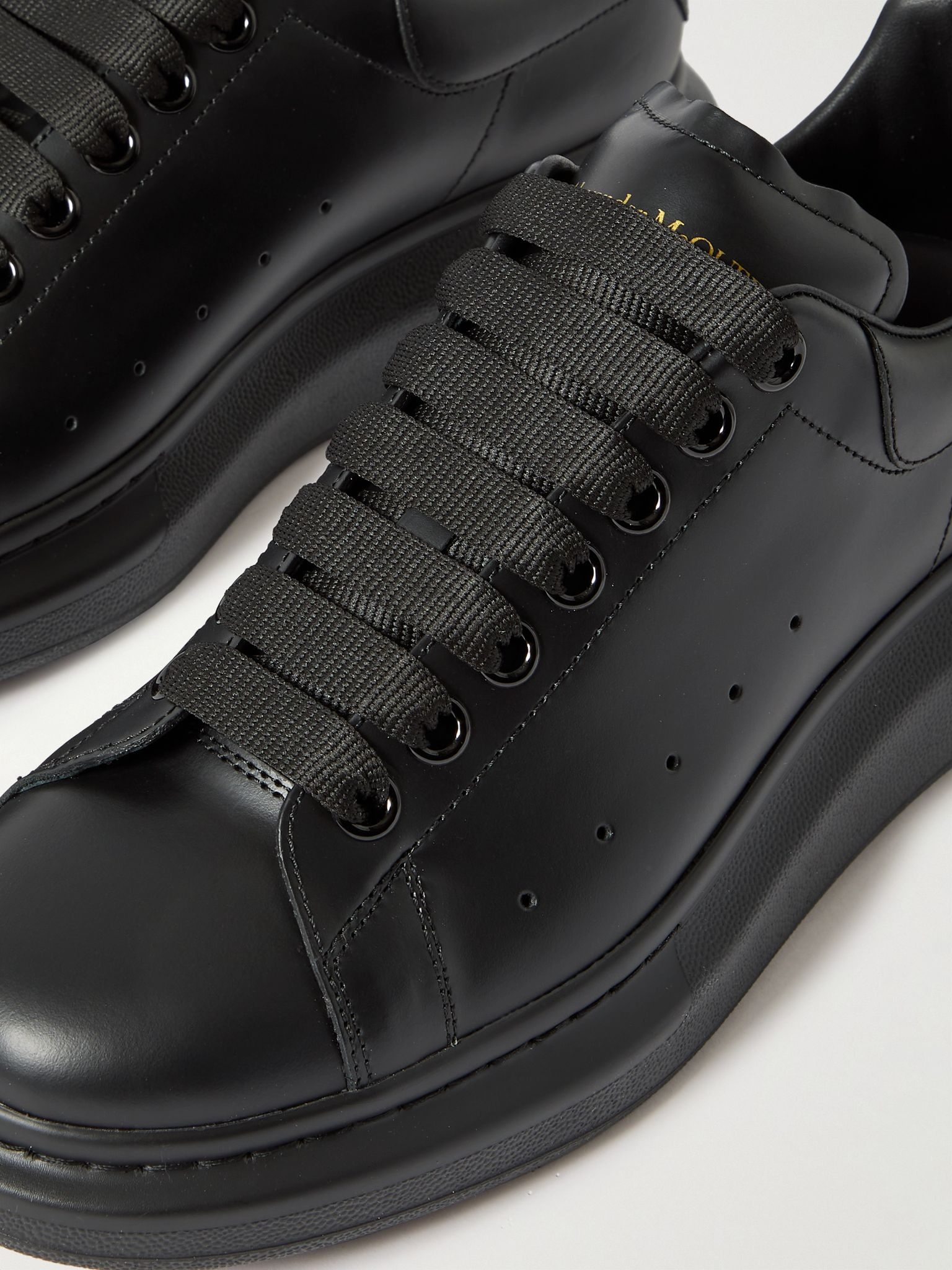 Exaggerated-Sole Studded Leather Sneakers Black - 6