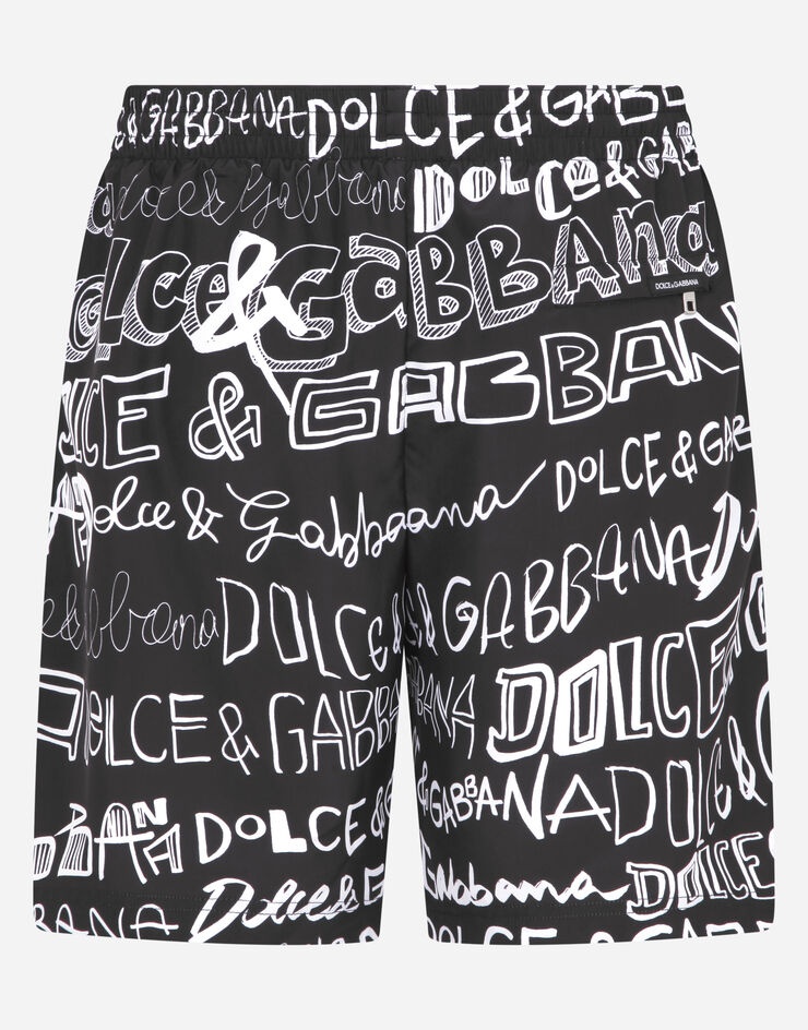 Mid-length swim trunks with all-over Dolce&Gabbana print - 1
