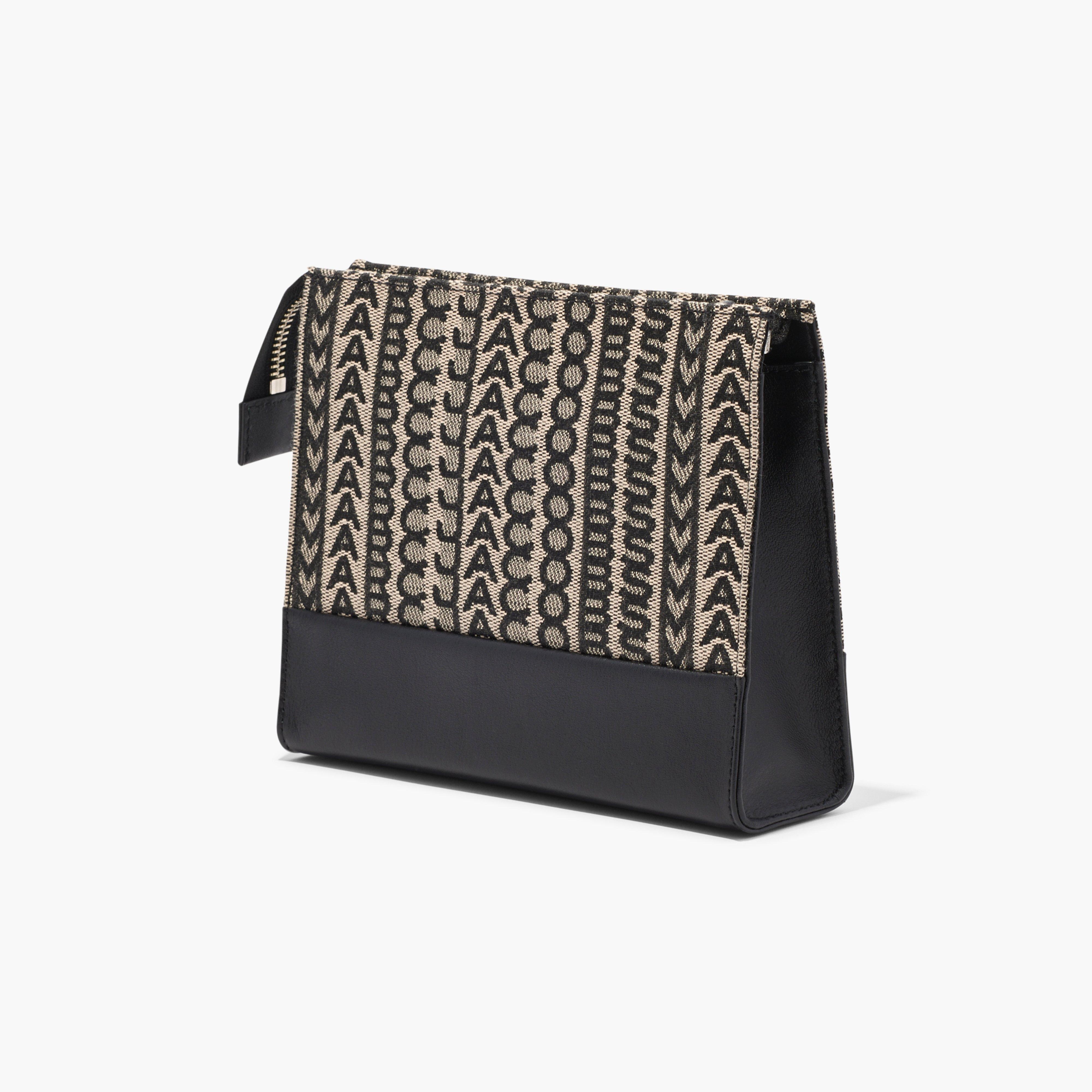 THE MONOGRAM TRAVEL POUCH - 2