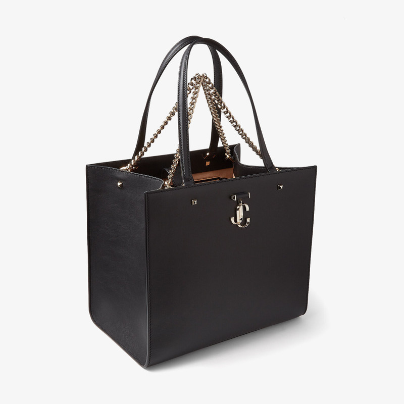 Varenne Tote Bag
Black Fine Shiny Calf Leather Tote Bag with Light Gold JC Emblem 6