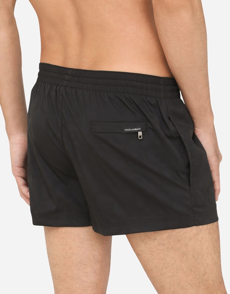 Short swim trunks in hydro-sensitive fabric with logo print - 5