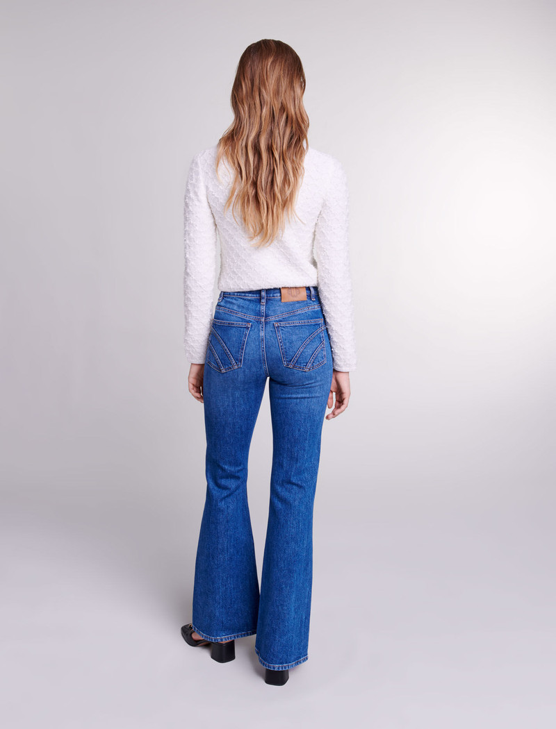 Embroidered flared jeans 4