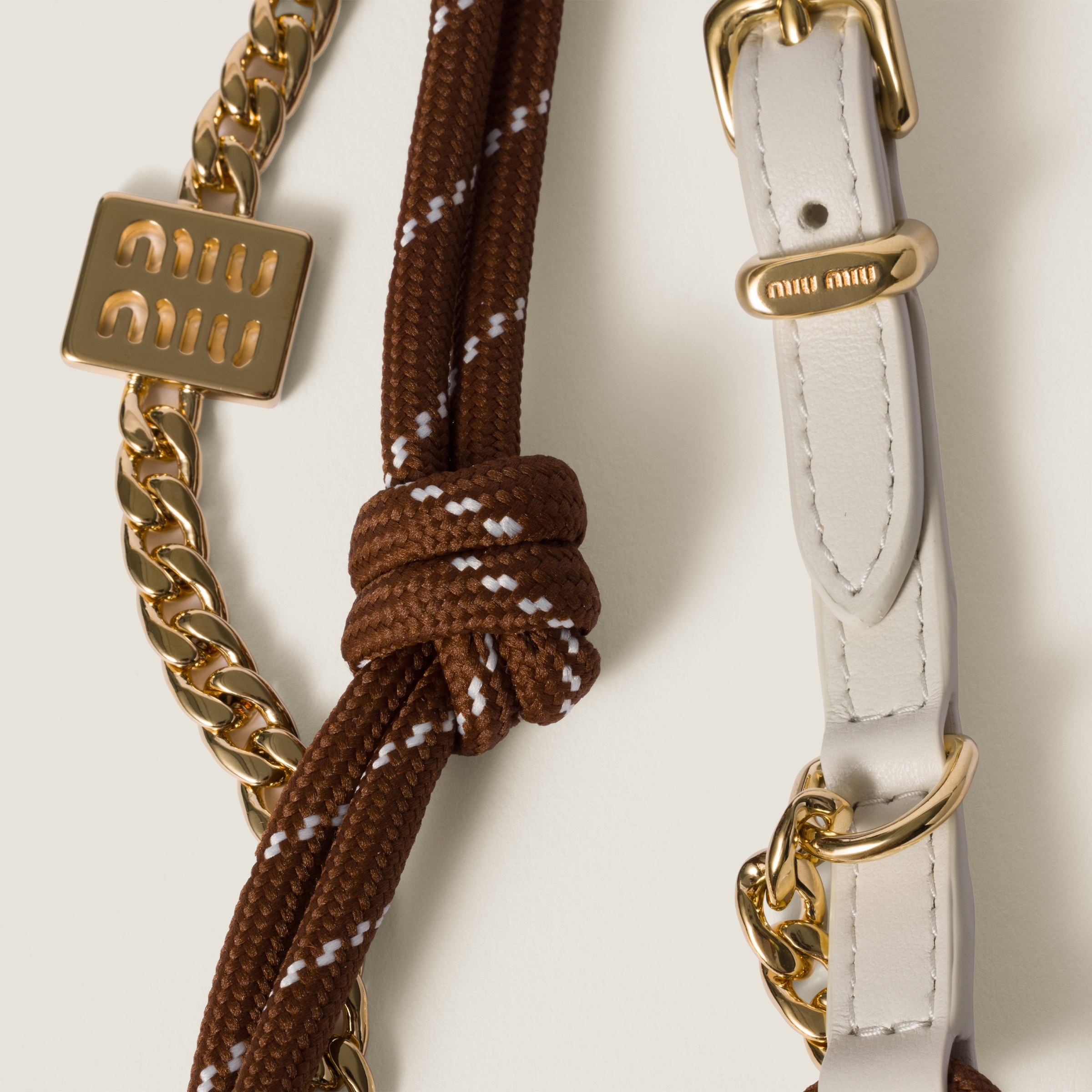Leather, cord, and metal trick - 3