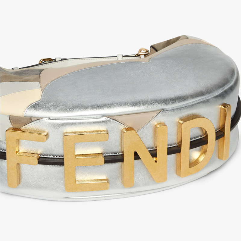 FENDI Medium hobo bag produced by inlaying leather, laminated leather and suede by hand to create a diagon outlook