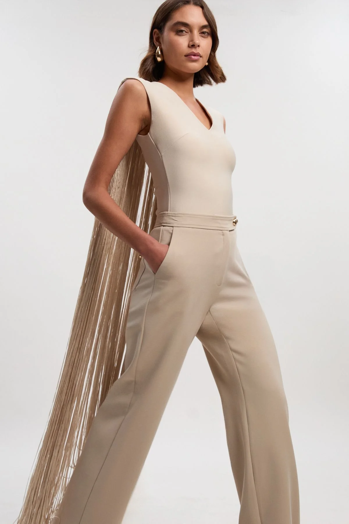 Figure Form Bandage Knit Long Tassel Cape Top - 1