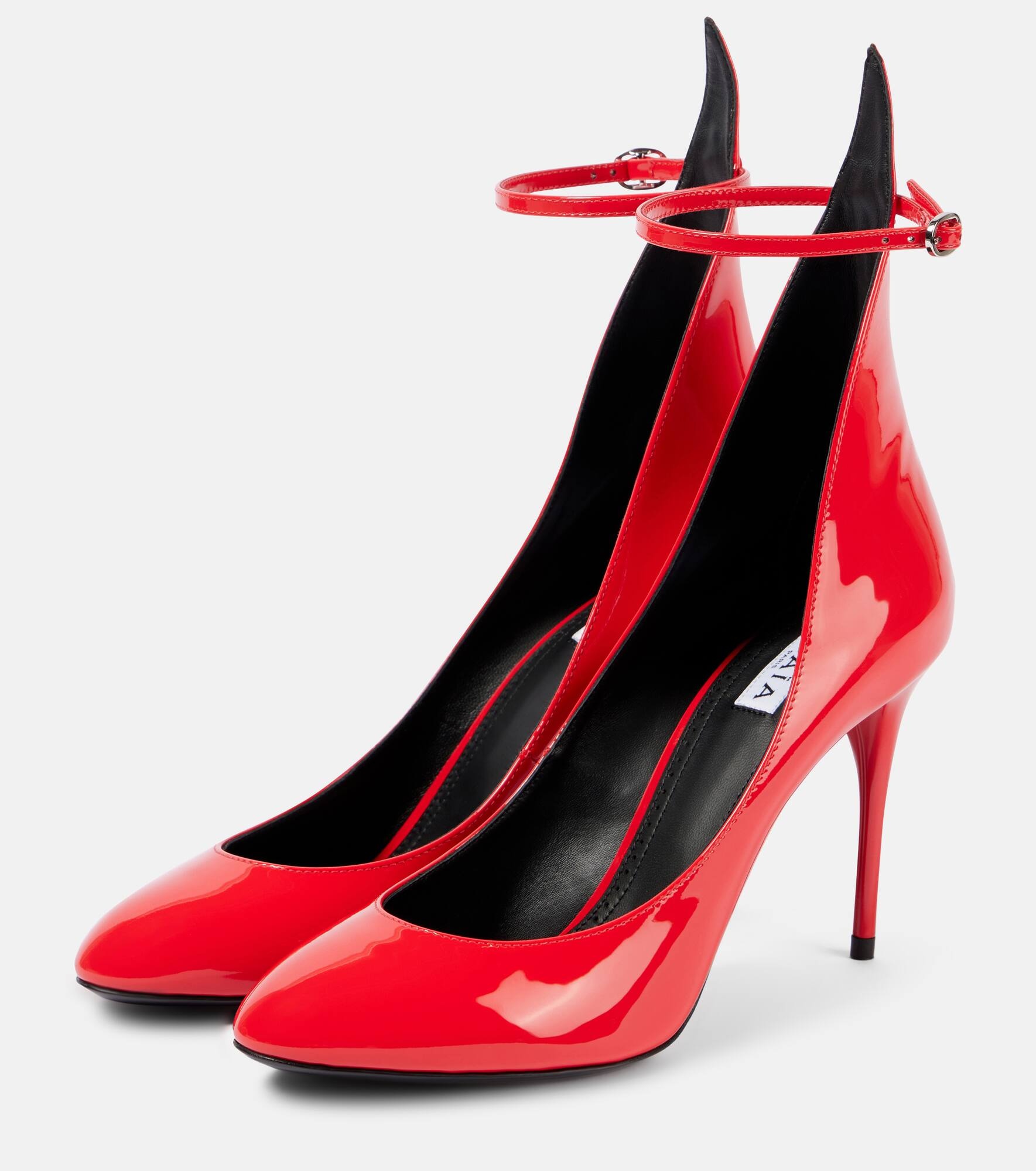 Décolleté patent leather pumps - 4