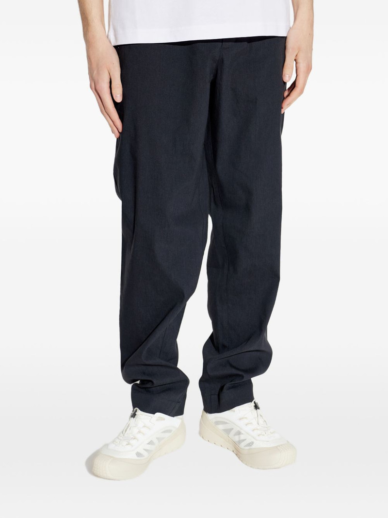 Technical logo-patch linen trousers 3