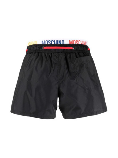 Moschino logo-waistband swim shorts outlook