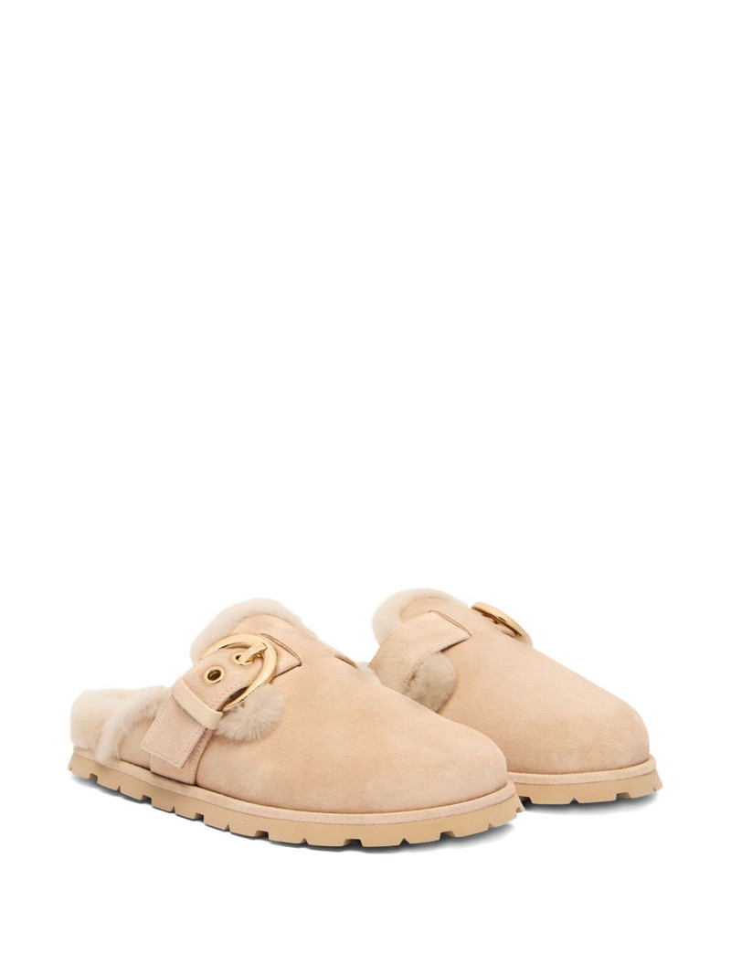 Stuart Weitzman Chrystie shearling mule outlook