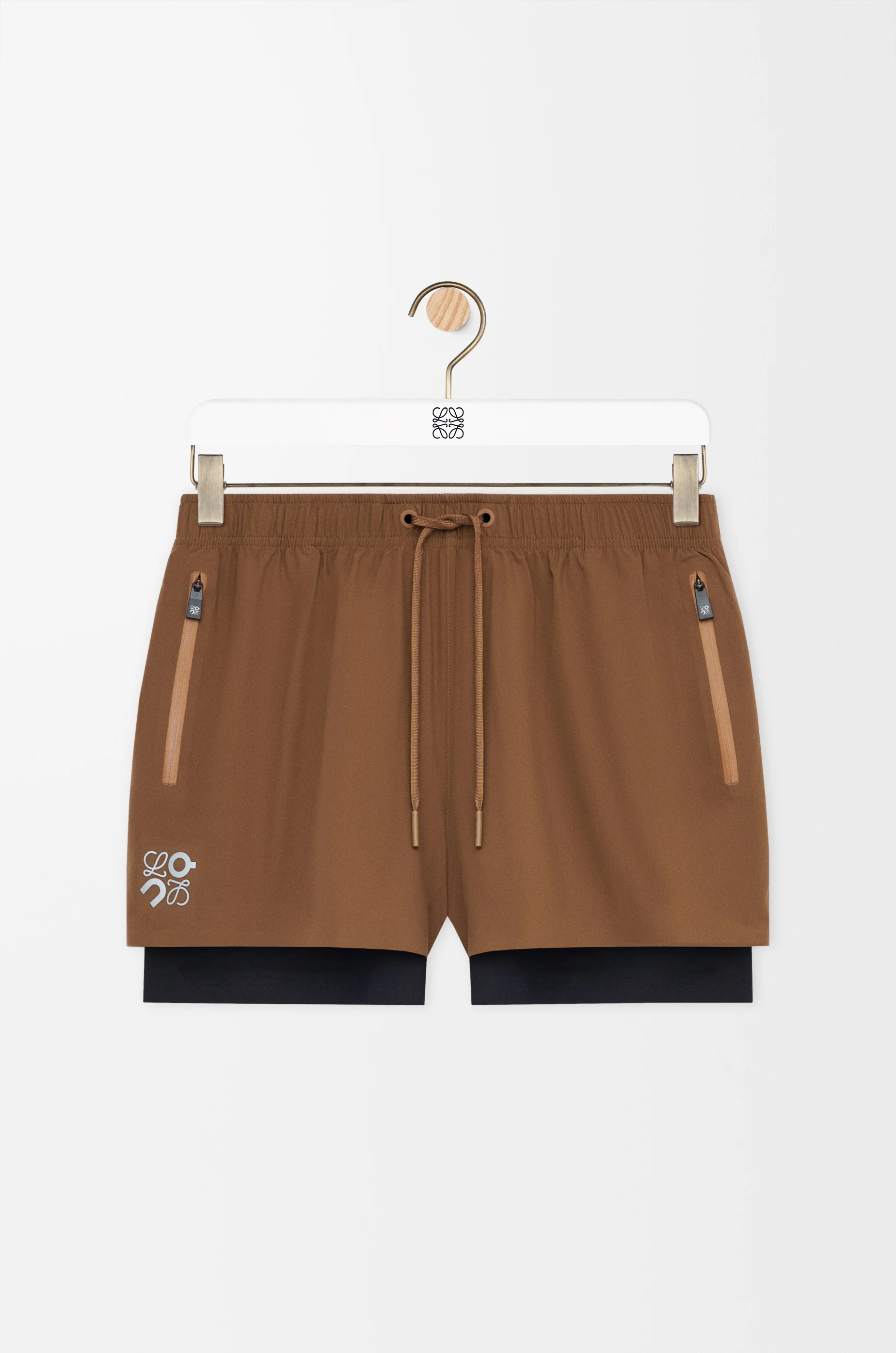 Performance shorts in technical shell - 1