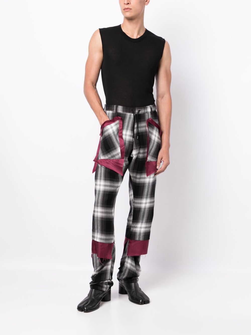 check-print asymmetric trousers - 2