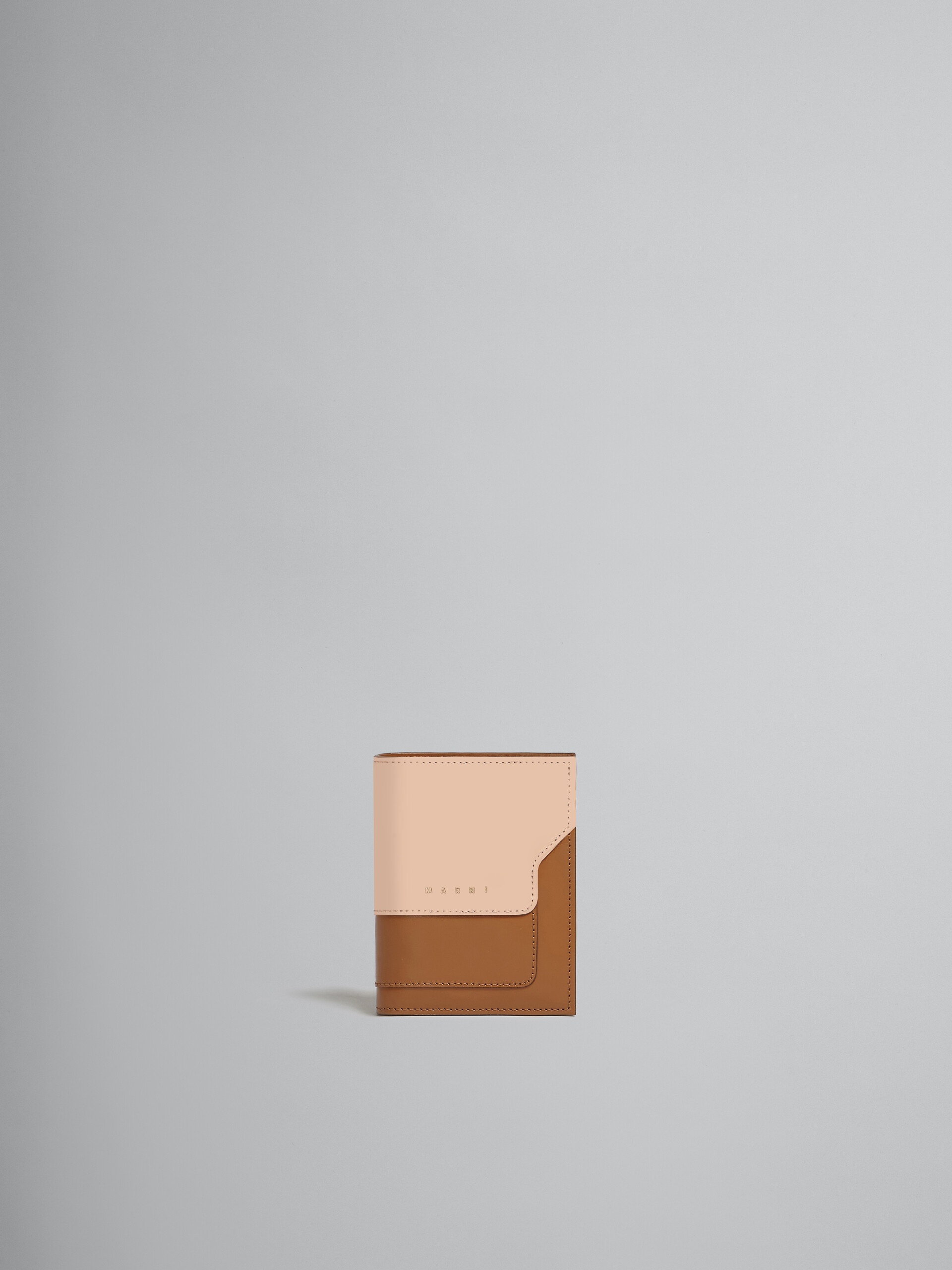 BROWN AND PINK LEATHER BI-FOLD WALLET - 1
