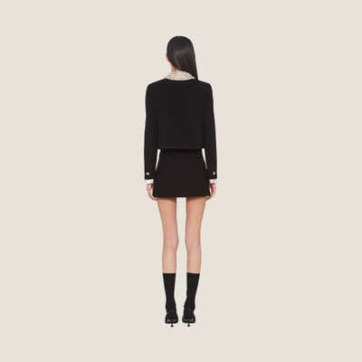 Miu Miu Bouclé tweed miniskirt outlook